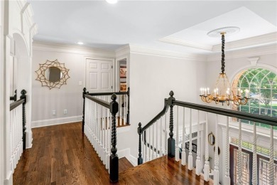Experience resort-style living on over an acre in this stunning on Alpharetta Athletic Club East in Georgia - for sale on GolfHomes.com, golf home, golf lot