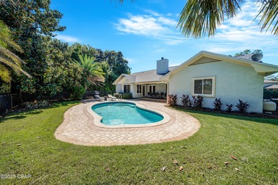 Welcome to 607 Amberjack Drive in the desirable Bay Point on Bay Point Resort Golf Club in Florida - for sale on GolfHomes.com, golf home, golf lot