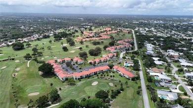 Peaceful and tranquil living comes to mind when you enter this on Miles Grant Country Club in Florida - for sale on GolfHomes.com, golf home, golf lot