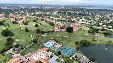 Peaceful and tranquil living comes to mind when you enter this on Miles Grant Country Club in Florida - for sale on GolfHomes.com, golf home, golf lot