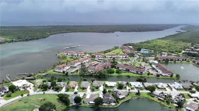 Peaceful and tranquil living comes to mind when you enter this on Miles Grant Country Club in Florida - for sale on GolfHomes.com, golf home, golf lot