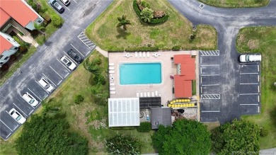 Peaceful and tranquil living comes to mind when you enter this on Miles Grant Country Club in Florida - for sale on GolfHomes.com, golf home, golf lot