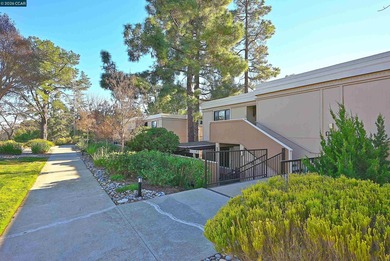 Upper end-unit Monterey CO-OP is move in ready and it's priced on Rossmoor Golf Course in California - for sale on GolfHomes.com, golf home, golf lot