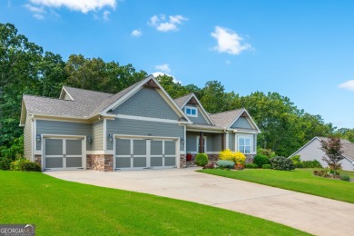Peaceful living meets modern comfort in this stunning Canton on The Fairways at Laurel Canyon in Georgia - for sale on GolfHomes.com, golf home, golf lot