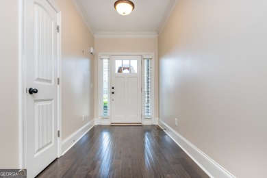 Peaceful living meets modern comfort in this stunning Canton on The Fairways at Laurel Canyon in Georgia - for sale on GolfHomes.com, golf home, golf lot