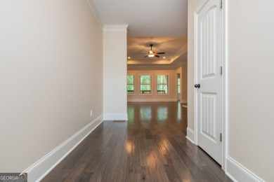 Peaceful living meets modern comfort in this stunning Canton on The Fairways at Laurel Canyon in Georgia - for sale on GolfHomes.com, golf home, golf lot