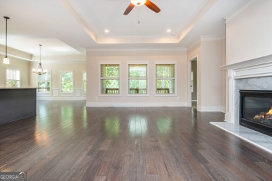 Peaceful living meets modern comfort in this stunning Canton on The Fairways at Laurel Canyon in Georgia - for sale on GolfHomes.com, golf home, golf lot