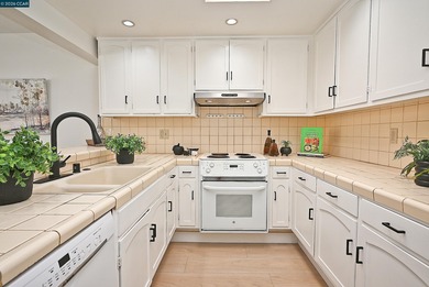 Upper end-unit Monterey CO-OP is move in ready and it's priced on Rossmoor Golf Course in California - for sale on GolfHomes.com, golf home, golf lot