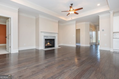 Peaceful living meets modern comfort in this stunning Canton on The Fairways at Laurel Canyon in Georgia - for sale on GolfHomes.com, golf home, golf lot