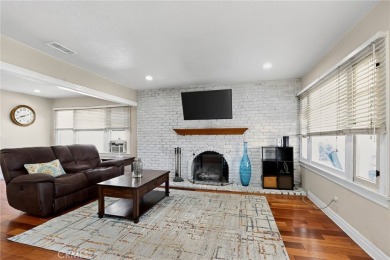 Discover this Spanish-style fixer located on a desirable corner on Mile Square Golf Course in California - for sale on GolfHomes.com, golf home, golf lot