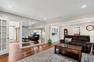 Discover this Spanish-style fixer located on a desirable corner on Mile Square Golf Course in California - for sale on GolfHomes.com, golf home, golf lot