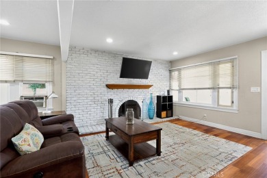 Discover this Spanish-style fixer located on a desirable corner on Mile Square Golf Course in California - for sale on GolfHomes.com, golf home, golf lot
