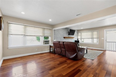 Discover this Spanish-style fixer located on a desirable corner on Mile Square Golf Course in California - for sale on GolfHomes.com, golf home, golf lot