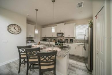 Fully furnished 5-bedroom; 5-bathroom extremely well-maintained on The Oasis Club at Champions Gate in Florida - for sale on GolfHomes.com, golf home, golf lot