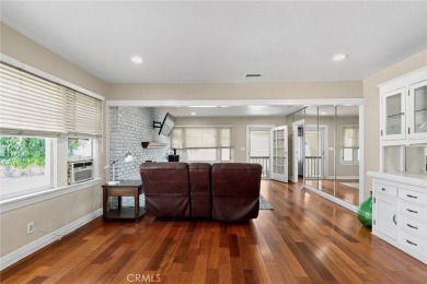 Discover this Spanish-style fixer located on a desirable corner on Mile Square Golf Course in California - for sale on GolfHomes.com, golf home, golf lot