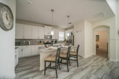 Fully furnished 5-bedroom; 5-bathroom extremely well-maintained on The Oasis Club at Champions Gate in Florida - for sale on GolfHomes.com, golf home, golf lot