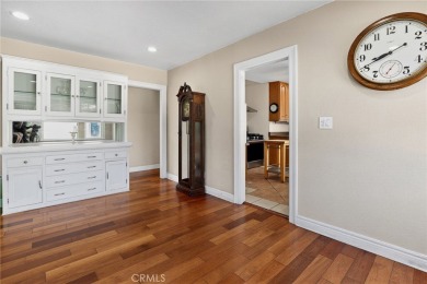 Discover this Spanish-style fixer located on a desirable corner on Mile Square Golf Course in California - for sale on GolfHomes.com, golf home, golf lot