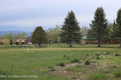 Great golf course lot with trees and flat. The lot is on #8 on Cedar Creek Golf Course in Wyoming - for sale on GolfHomes.com, golf home, golf lot