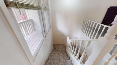 Discover the charm of Bella Vista living in this inviting on Bella Vista Country Club and Golf Course in Arkansas - for sale on GolfHomes.com, golf home, golf lot