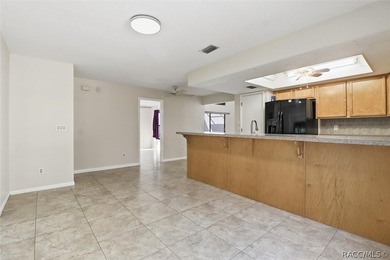 Nice and spacious three-bedroom, two-bath home ideally situated on Sugarmill Woods Golf and Country Club in Florida - for sale on GolfHomes.com, golf home, golf lot