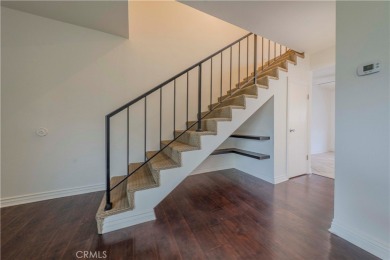 Don't miss this stunning 3-bedroom, 2.5-bath end-unit condo in on Anaheim Hills Golf Course in California - for sale on GolfHomes.com, golf home, golf lot