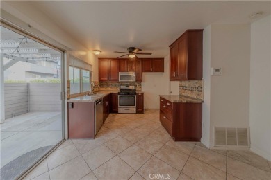 Don't miss this stunning 3-bedroom, 2.5-bath end-unit condo in on Anaheim Hills Golf Course in California - for sale on GolfHomes.com, golf home, golf lot