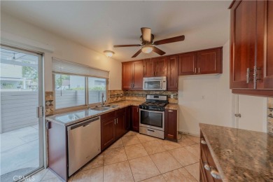 Don't miss this stunning 3-bedroom, 2.5-bath end-unit condo in on Anaheim Hills Golf Course in California - for sale on GolfHomes.com, golf home, golf lot