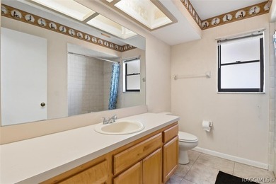 Nice and spacious three-bedroom, two-bath home ideally situated on Sugarmill Woods Golf and Country Club in Florida - for sale on GolfHomes.com, golf home, golf lot