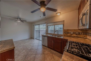 Don't miss this stunning 3-bedroom, 2.5-bath end-unit condo in on Anaheim Hills Golf Course in California - for sale on GolfHomes.com, golf home, golf lot