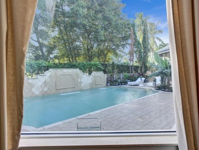 MOTIVATED SELLER!!! This 5,762 sq ft residence offers soaring on Boca Grove Golf and Tennis in Florida - for sale on GolfHomes.com, golf home, golf lot