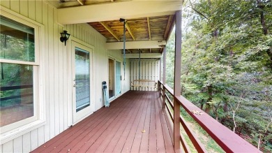 Discover the charm of Bella Vista living in this inviting on Bella Vista Country Club and Golf Course in Arkansas - for sale on GolfHomes.com, golf home, golf lot