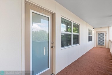 Experience effortless, resort-style living in this fully updated on Wynmoor Golf Course in Florida - for sale on GolfHomes.com, golf home, golf lot