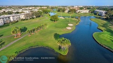 Experience effortless, resort-style living in this fully updated on Wynmoor Golf Course in Florida - for sale on GolfHomes.com, golf home, golf lot