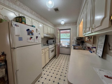 Welcome to this 4 bedroom, 2 bath home offering 1,816 sq ft of on Indian Hills Country Club in Arkansas - for sale on GolfHomes.com, golf home, golf lot