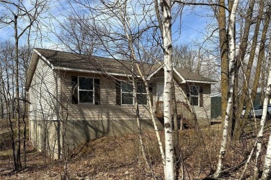 Immaculate 2 bed, 2 bath 1102 Sf, 2012 built home on .45 acres on Hardwoods Golf Club At Mille Lacs in Minnesota - for sale on GolfHomes.com, golf home, golf lot