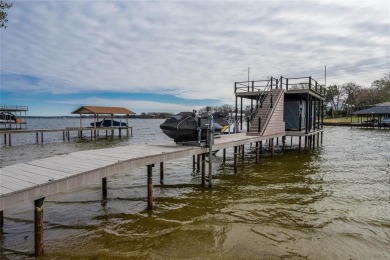 This fresh, modern lakehome redesign lends itself to a french on Star Harbor Golf Club in Texas - for sale on GolfHomes.com, golf home, golf lot