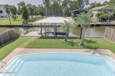 Welcome to your dream home on the water, where every detail has on Pass Christian Isles Golf Club in Mississippi - for sale on GolfHomes.com, golf home, golf lot