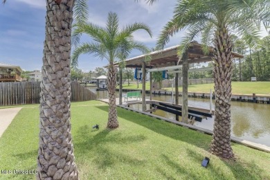 Welcome to your dream home on the water, where every detail has on Pass Christian Isles Golf Club in Mississippi - for sale on GolfHomes.com, golf home, golf lot