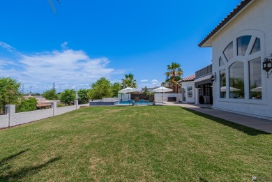 This custom home in the Dunes neighborhood is ready for new on Desert Hills Golf Course in Arizona - for sale on GolfHomes.com, golf home, golf lot
