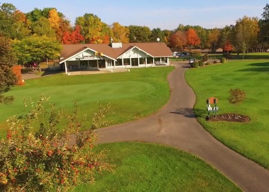 Spacious executive home on the beautiful Pines Golf Course in on Michaywe Pines Course in Michigan - for sale on GolfHomes.com, golf home, golf lot