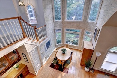 Located in sought-after Governor's Land, this all-brick custom on Two Rivers Country Club in Virginia - for sale on GolfHomes.com, golf home, golf lot