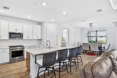 From the moment you pull into the driveway at 20412 Napa Loop on Old Corkscrew Golf Club in Florida - for sale on GolfHomes.com, golf home, golf lot