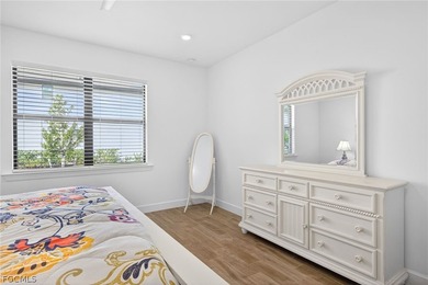 From the moment you pull into the driveway at 20412 Napa Loop on Old Corkscrew Golf Club in Florida - for sale on GolfHomes.com, golf home, golf lot