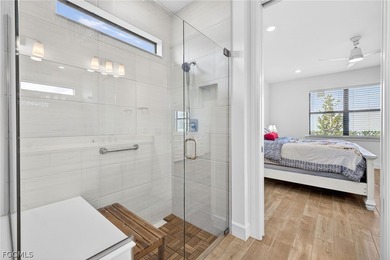 From the moment you pull into the driveway at 20412 Napa Loop on Old Corkscrew Golf Club in Florida - for sale on GolfHomes.com, golf home, golf lot