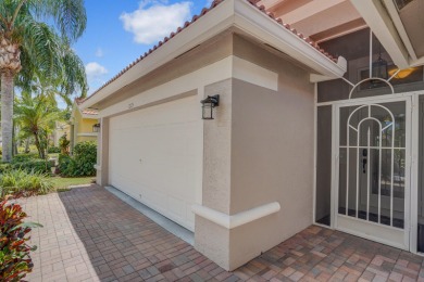 RARELY AVAILABLE EXTENDED GENOVA MODEL SET ON A BEAUTIFUL CANAL on Westchester Golf and Country Club in Florida - for sale on GolfHomes.com, golf home, golf lot