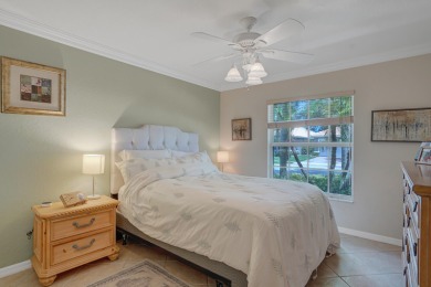 RARELY AVAILABLE EXTENDED GENOVA MODEL SET ON A BEAUTIFUL CANAL on Westchester Golf and Country Club in Florida - for sale on GolfHomes.com, golf home, golf lot