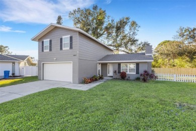 Step inside this meticulously kept, three bedroom, two and a on Baypoint Golf Club in Florida - for sale on GolfHomes.com, golf home, golf lot