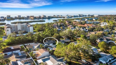 Step inside this meticulously kept, three bedroom, two and a on Baypoint Golf Club in Florida - for sale on GolfHomes.com, golf home, golf lot