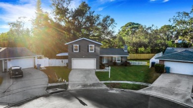 Step inside this meticulously kept, three bedroom, two and a on Baypoint Golf Club in Florida - for sale on GolfHomes.com, golf home, golf lot