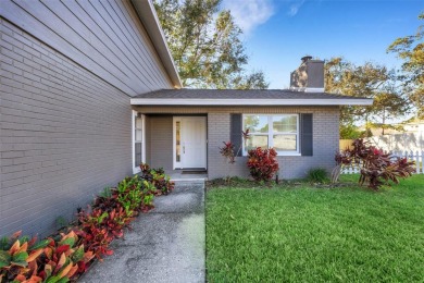 Step inside this meticulously kept, three bedroom, two and a on Baypoint Golf Club in Florida - for sale on GolfHomes.com, golf home, golf lot